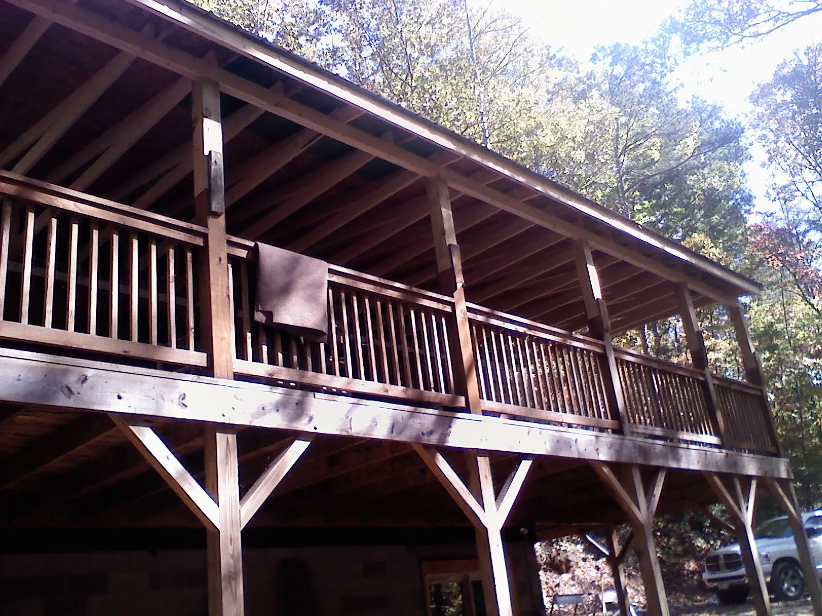 Timber framing under a new elevated porch and deck — Roof Leak Repair in River Grove by Roofing Brothers